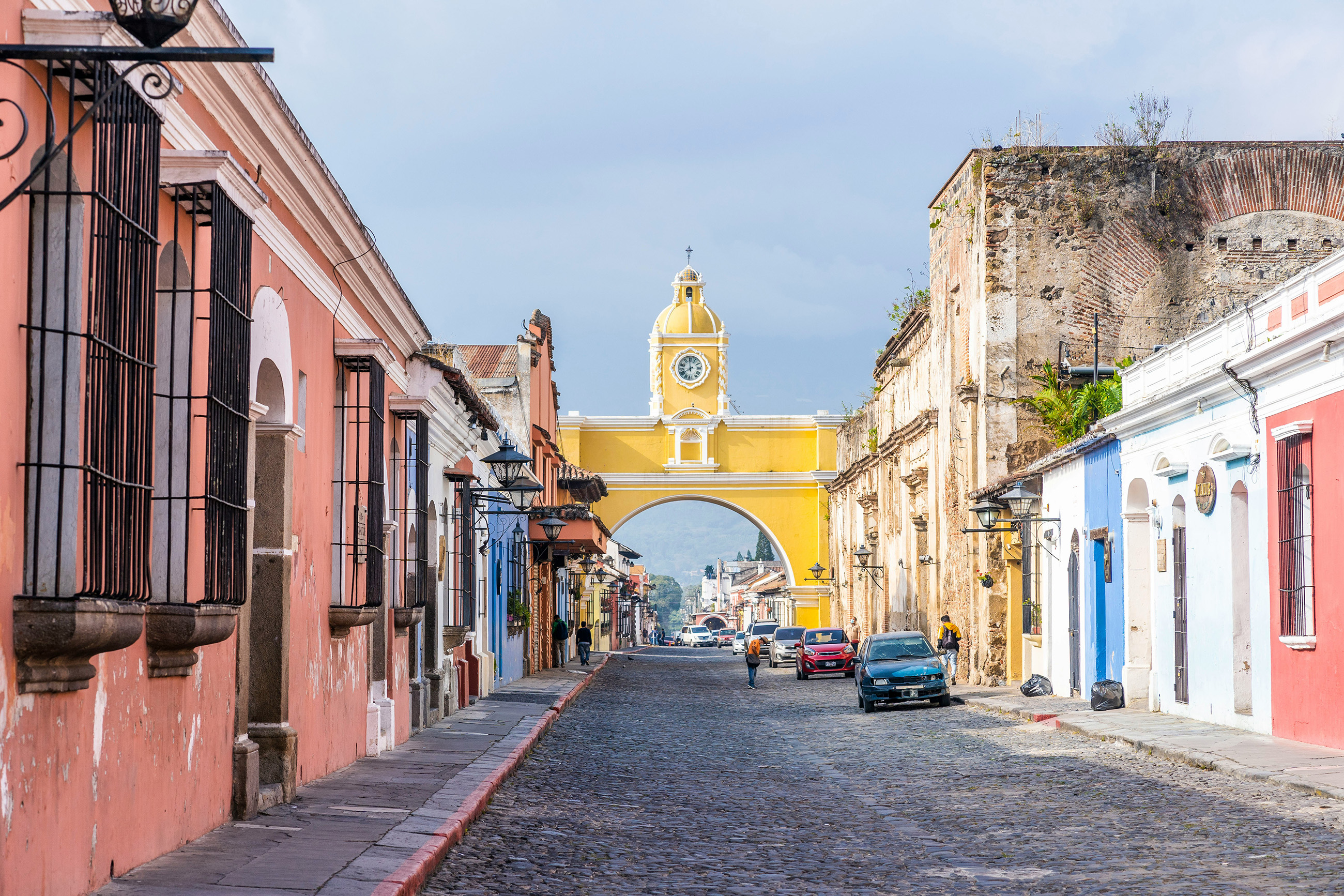 Colorful street with the Santa Catalina Arch in Antigua, Guatemala.
