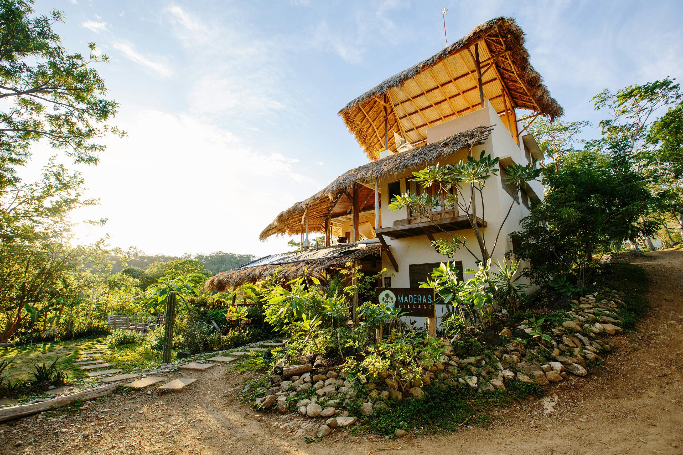 Luxury thatched-roof villa in a lush forest in San Juan del Sur, offering an upscale living experience for those looking to live in San Juan del Sur, close to nature.