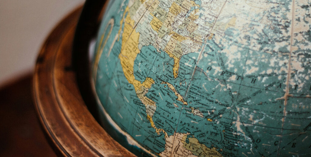 Globe highlighting Mexico, Central America, and South America.