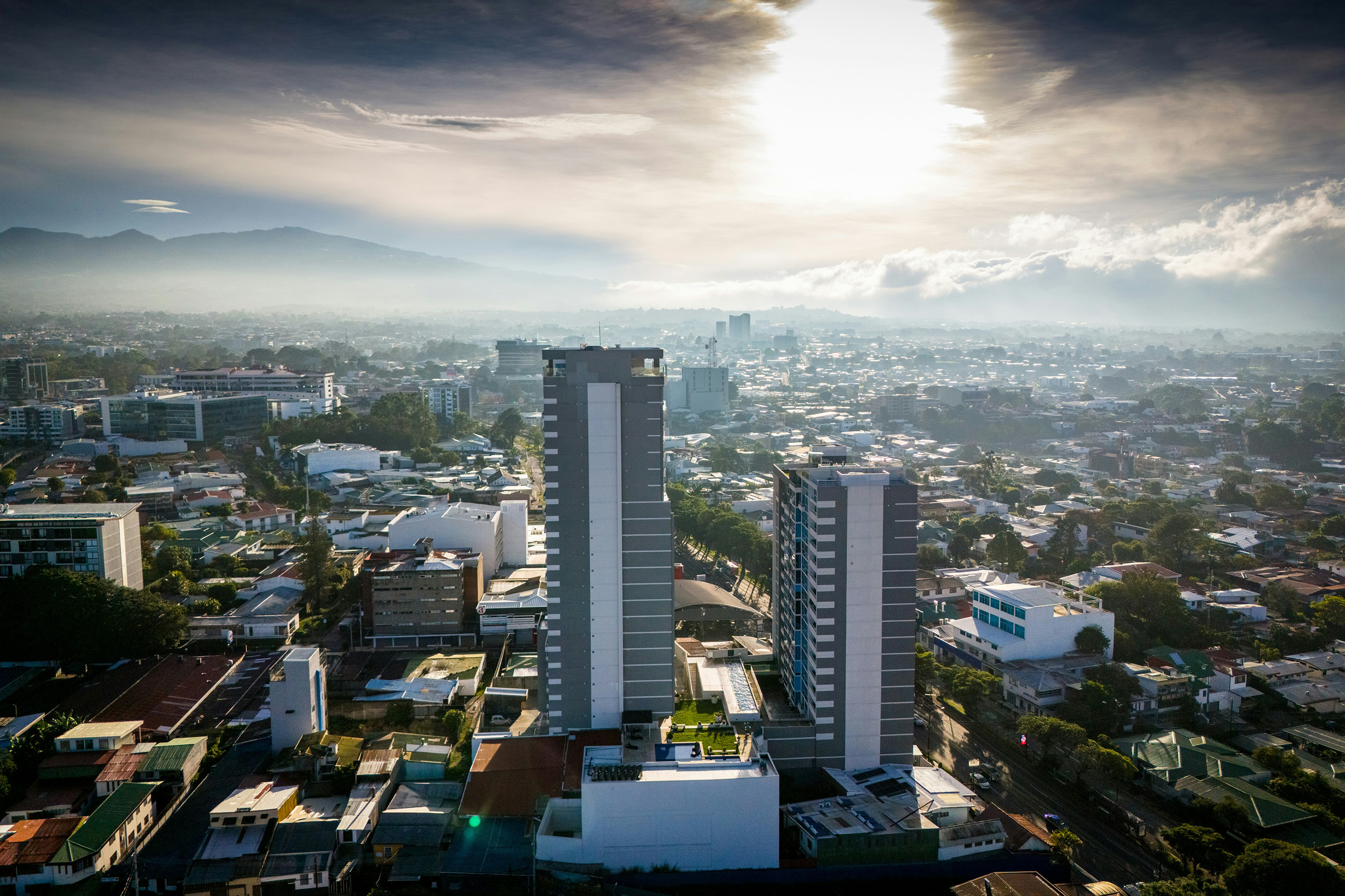 A view of Downtown San José, Costa Rica, with busy streets and a vibrant urban landscape.