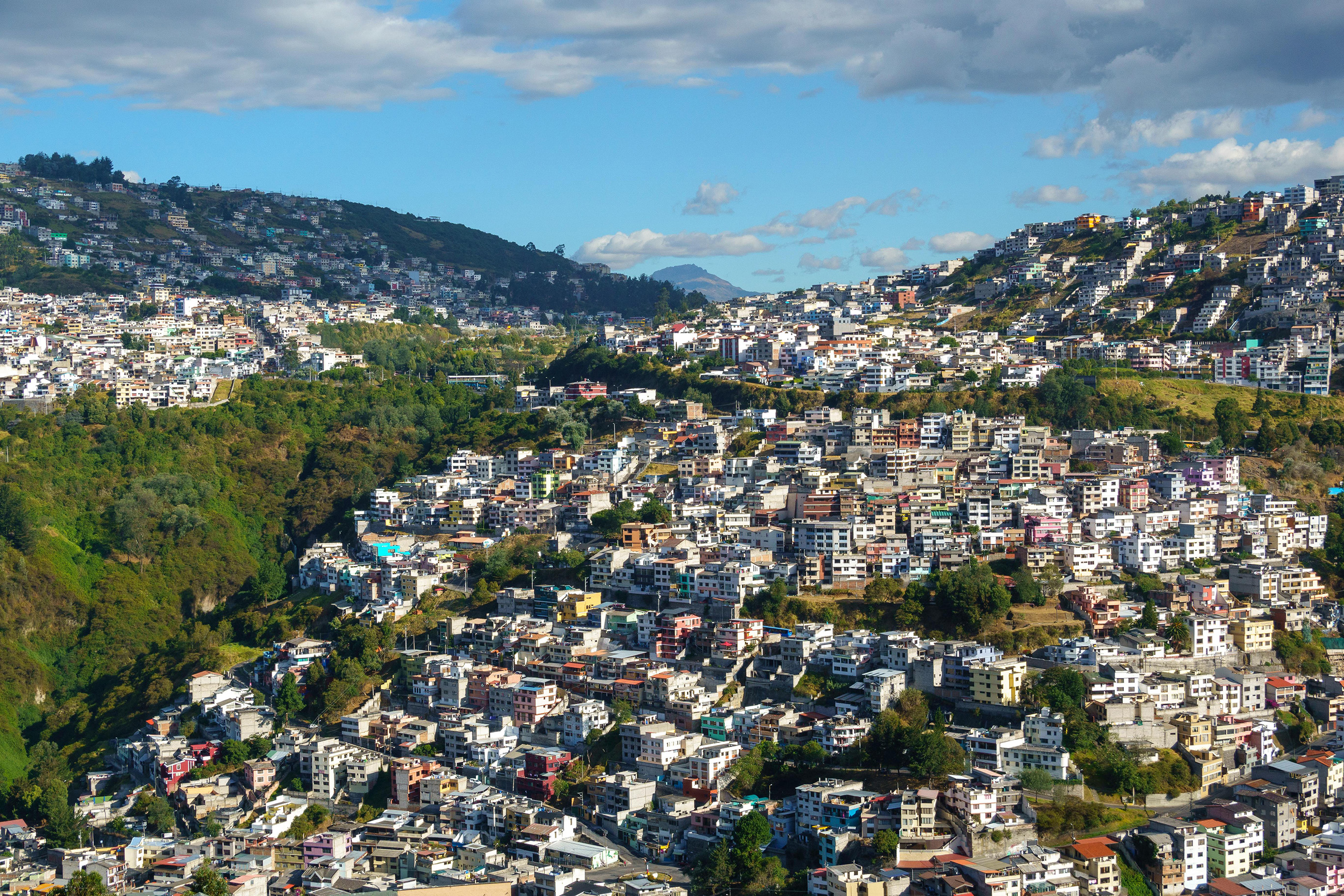 Hillside view of low-income housing surrounding Quito, Ecuador