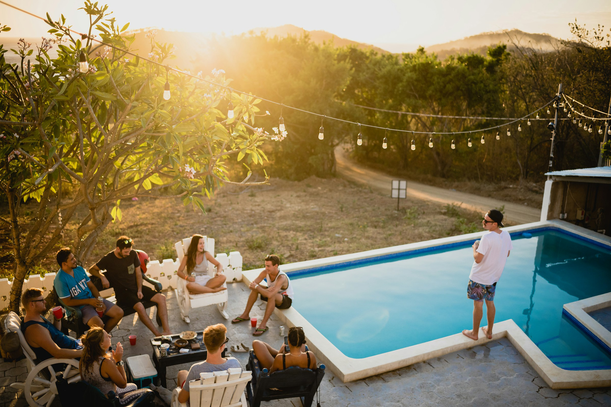 Group of expats enjoying a backyard pool party living in Nicaragua