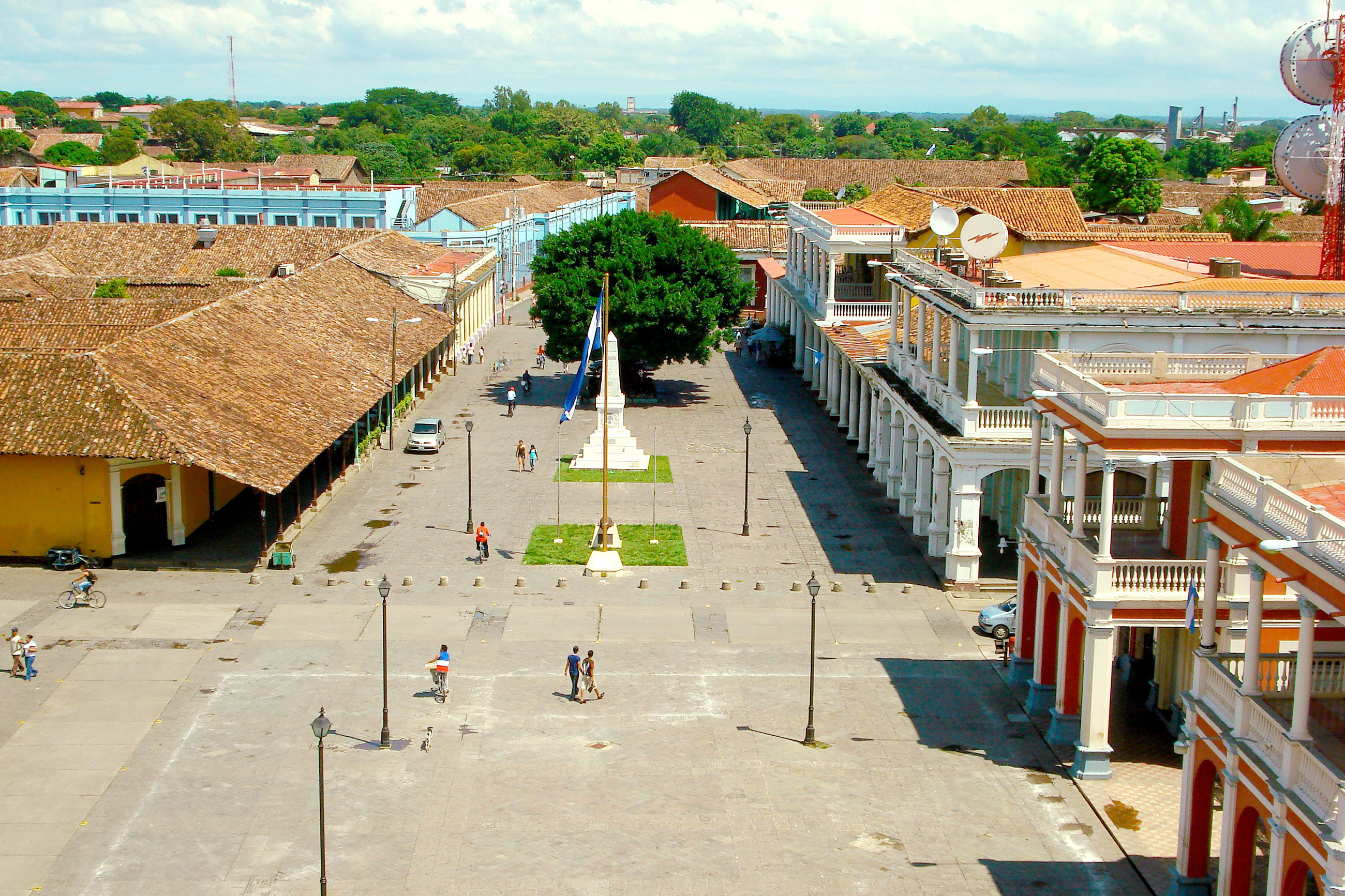 Historic government buildings surrounding a public square in Nicaragua