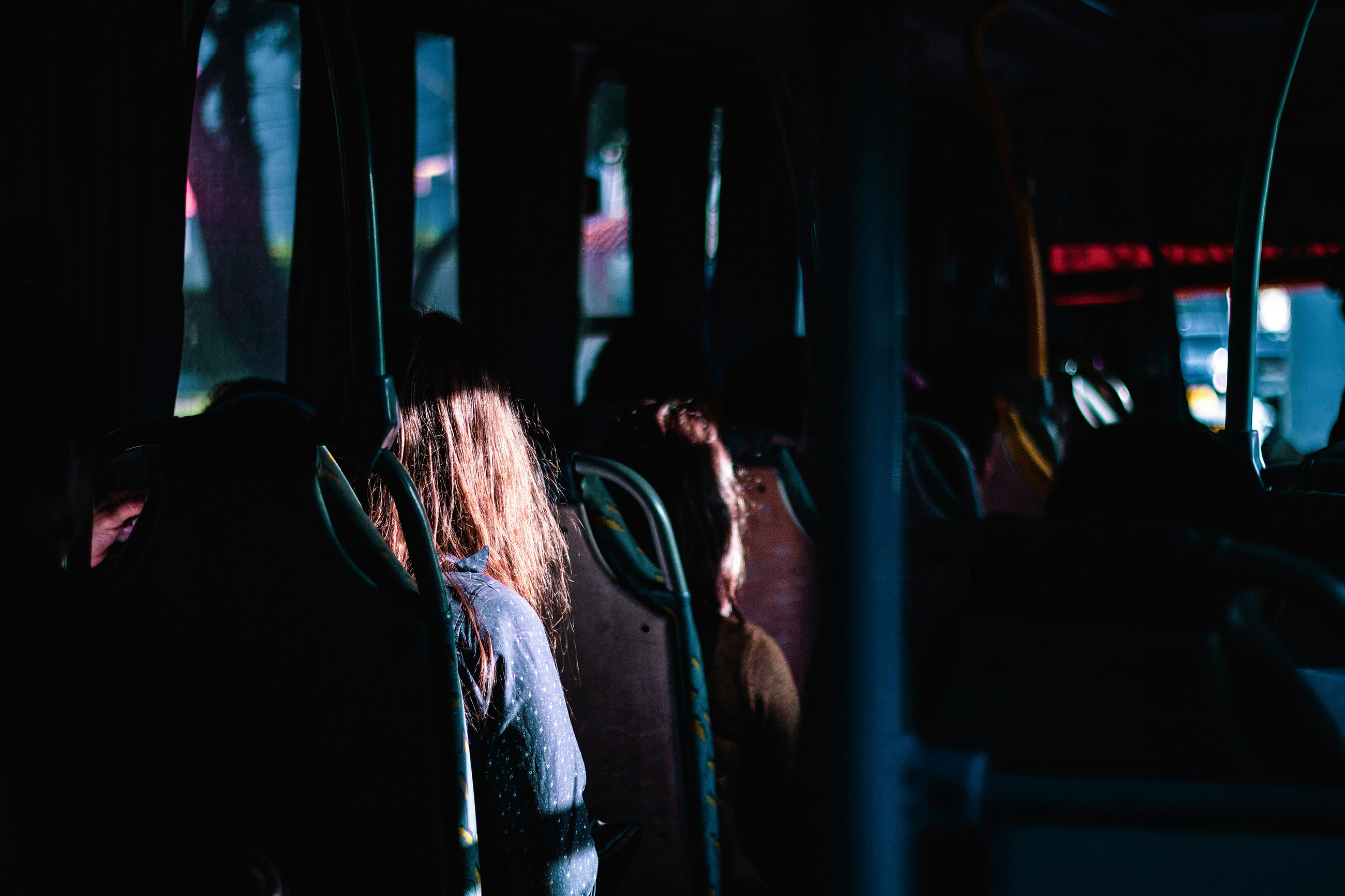 Passengers sitting on a bus in Paraguay.