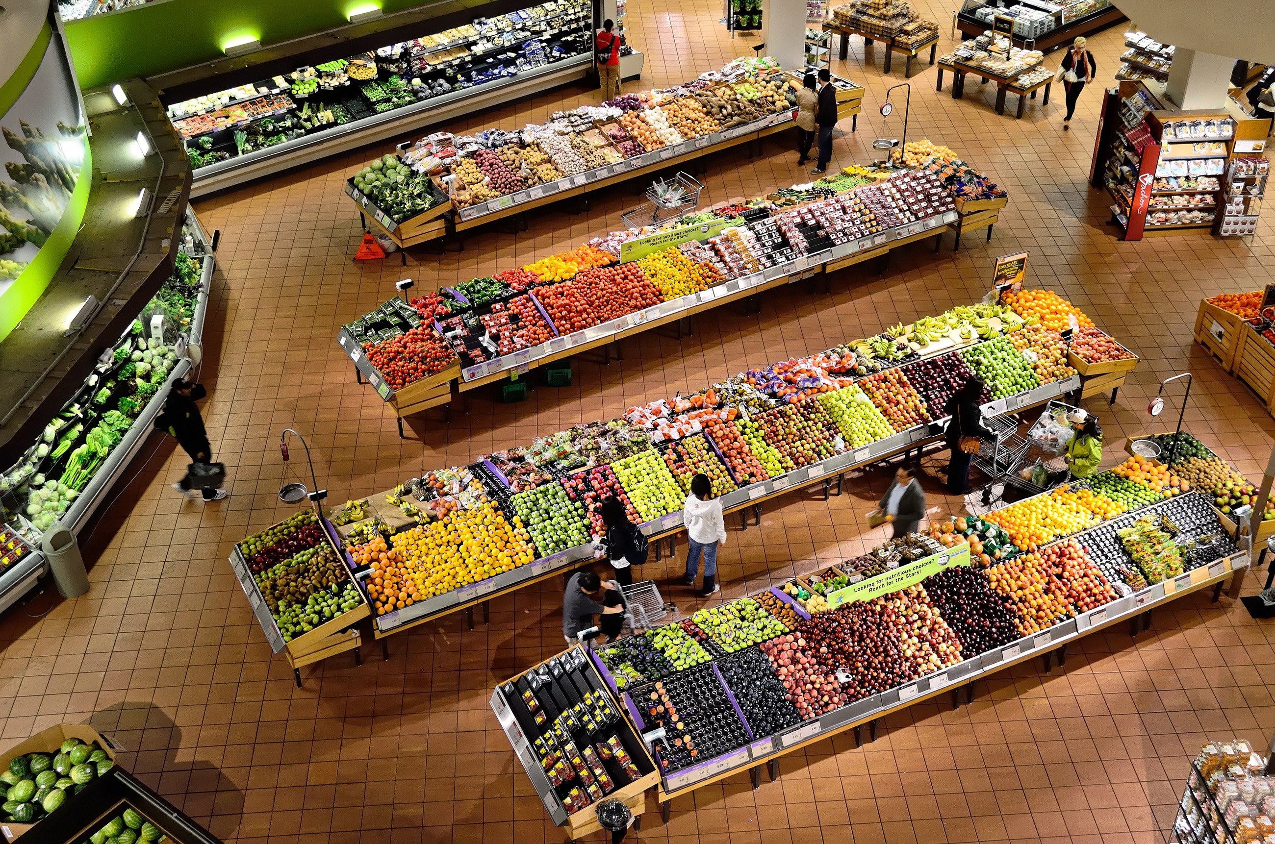 Fresh fruits and vegetables displayed in a grocery store in Paraguay.