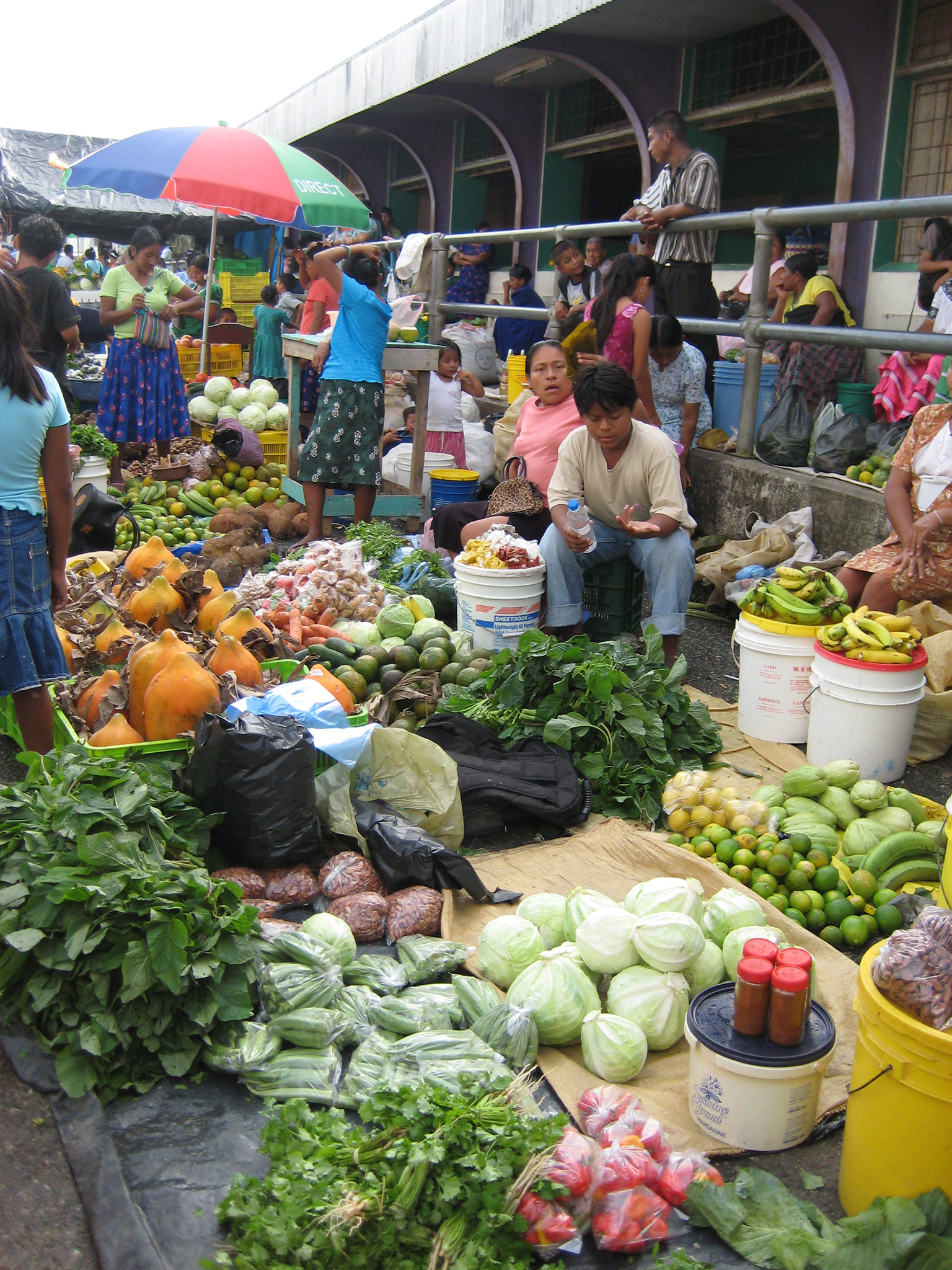 Vendors selling fresh local produce at Punta Gorda Market, Belize for people interested in living in Punta Gorda, Belize