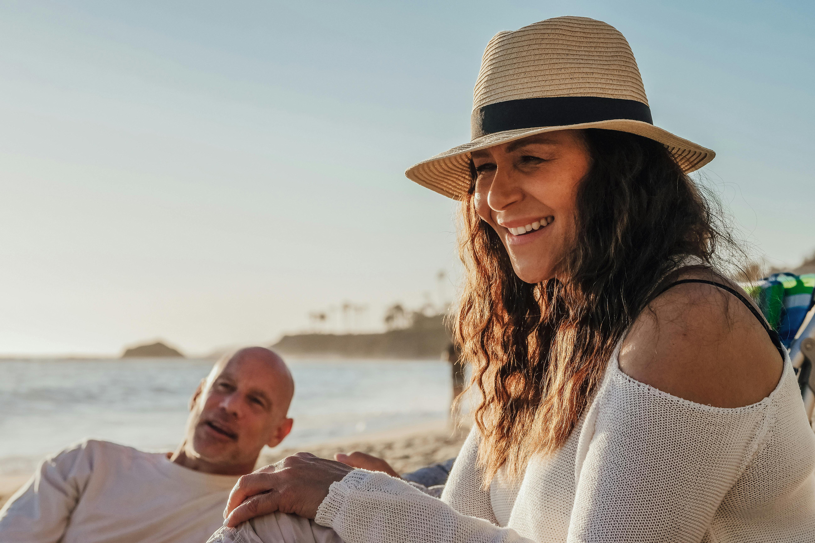 Happy retired couple enjoying beach life in Belize