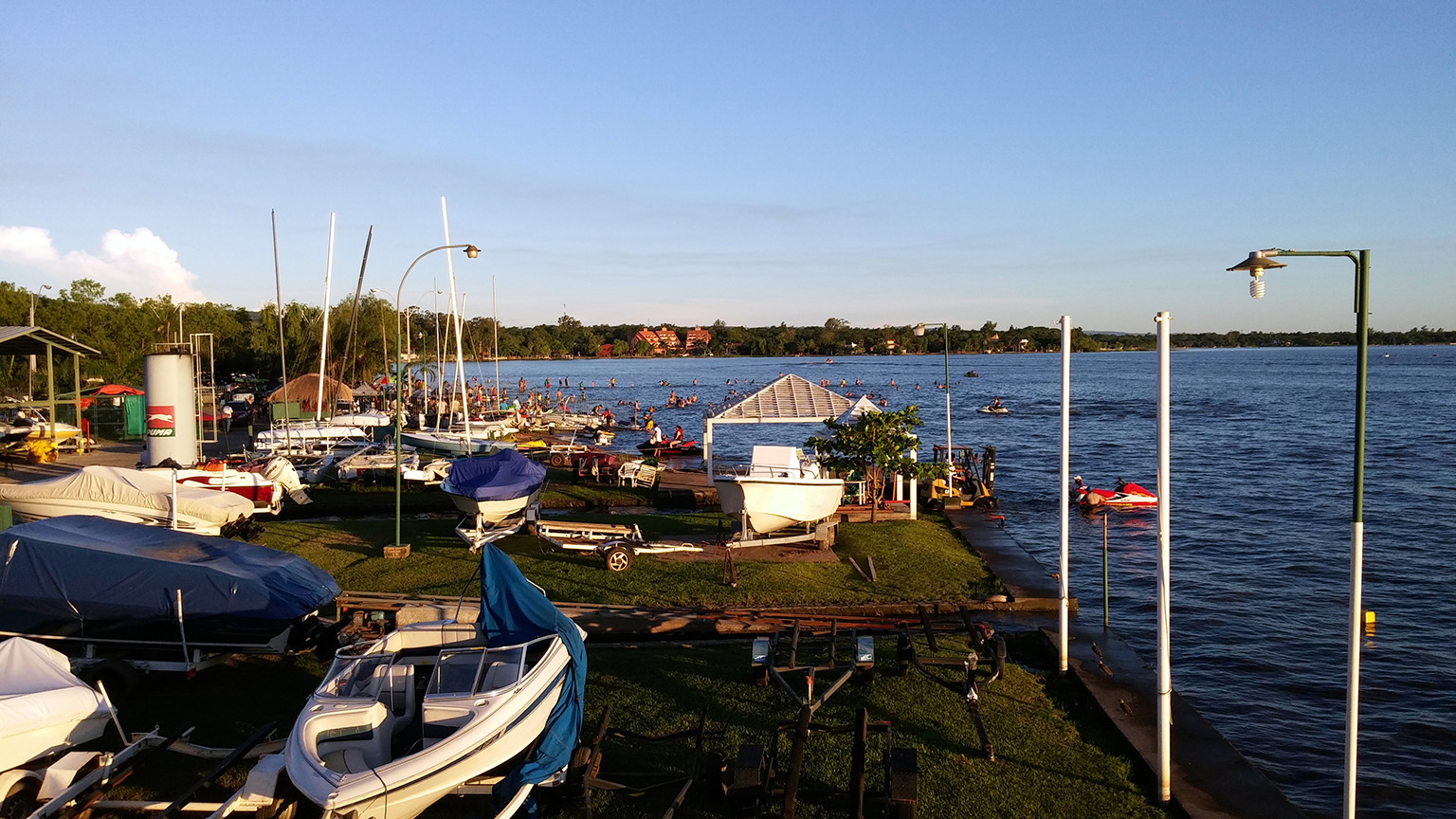 boat-launch-lake-ypacarai-swimmers-san-bernardino-paraguay Boat launch on Lake Ypacaraí with people swimming in San Bernardino Paraguay