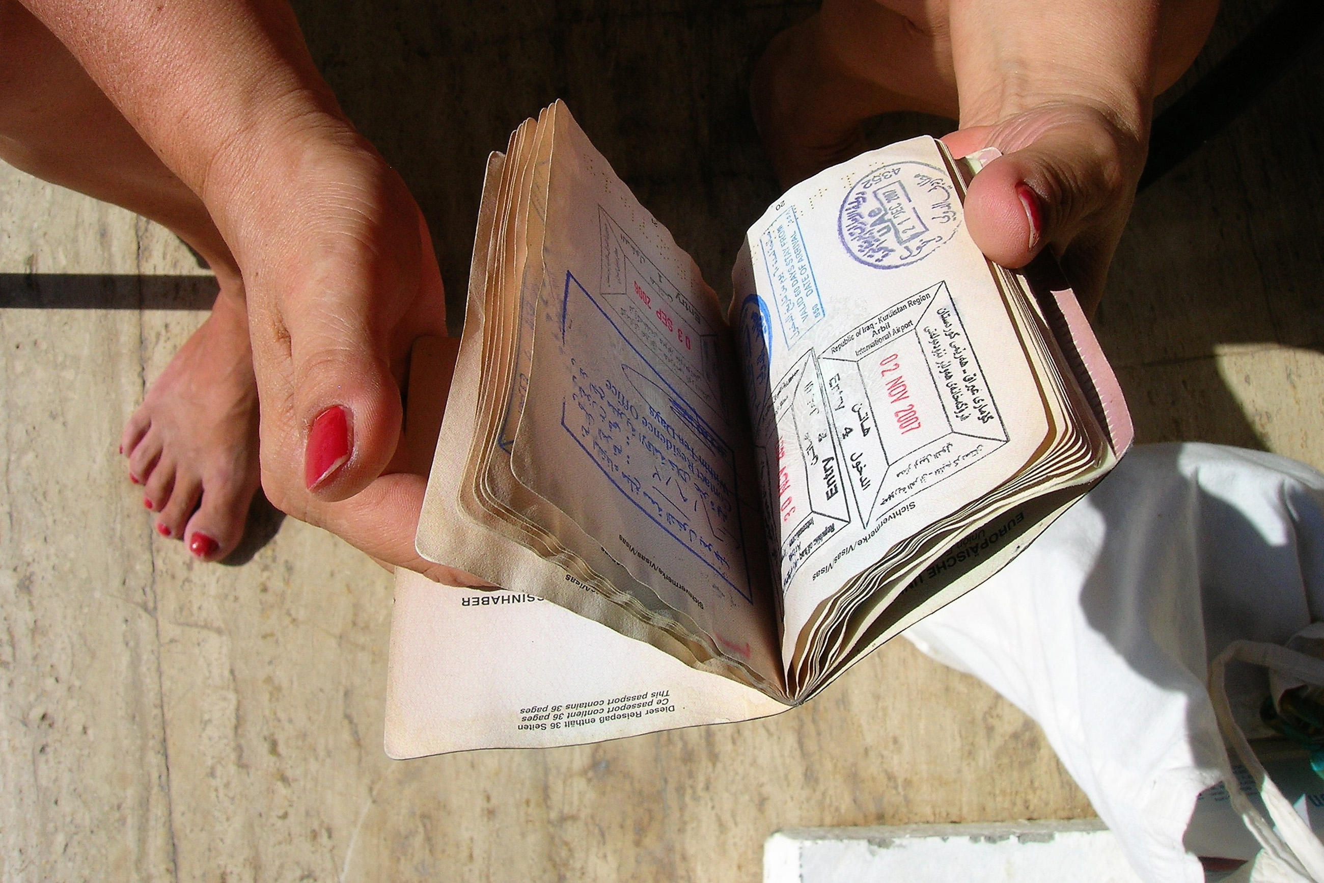 Passport with Belize visa stamps