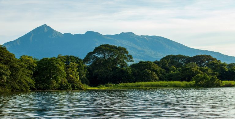Boat trip through the Granada Islets with scenic views of Mombacho Volcano in Granada Nicaragua