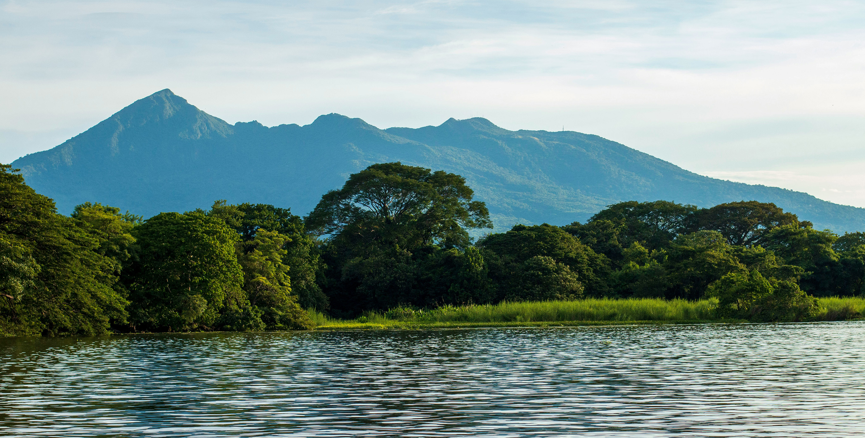 Boat trip through the Granada Islets with scenic views of Mombacho Volcano in Granada Nicaragua