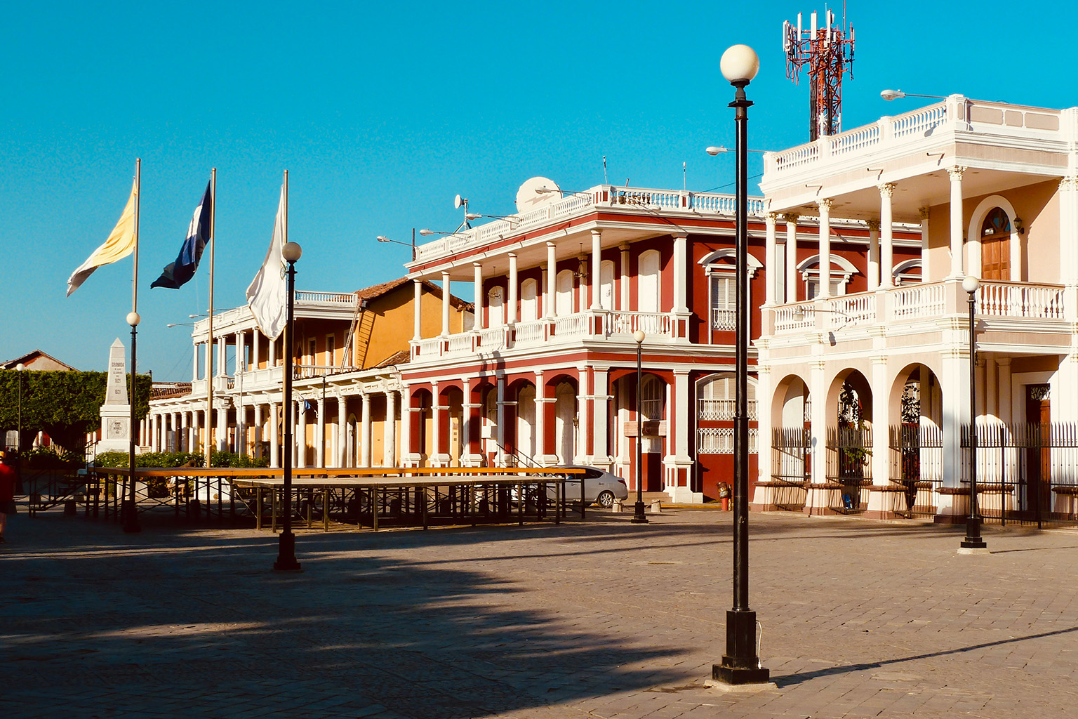 Colonial buildings in Granada Nicaragua’s Town Square, central hub for locals and tourists.