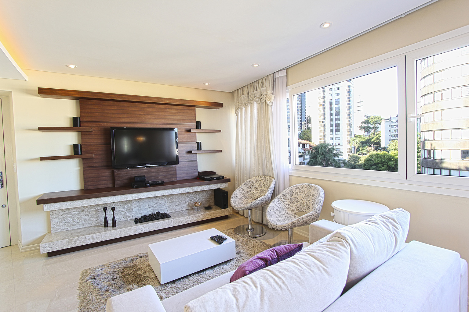 modern-condo-living-room-paraguay-buying-property-2026 Well-appointed modern condo living room in Paraguay – comfortable urban living when buying property in Paraguay 2026