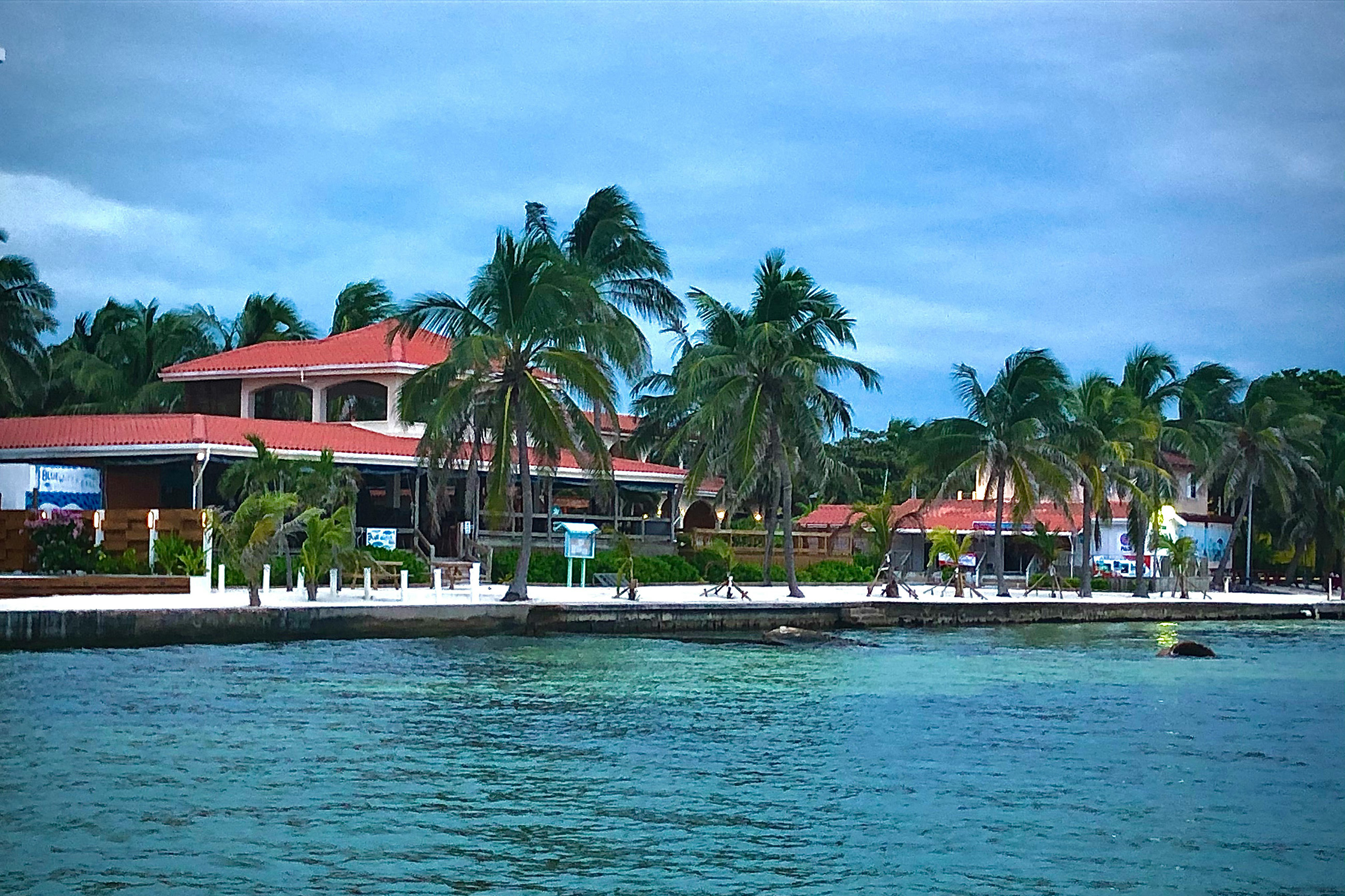 Luxury coastal resort in San Pedro Belize, contrasting tourism with expat life Belize realities
