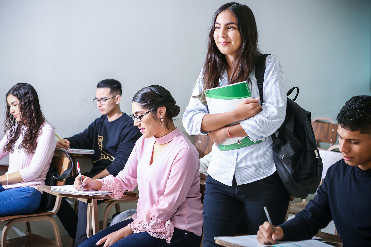 Teenagers studying together in a classroom in Paraguay