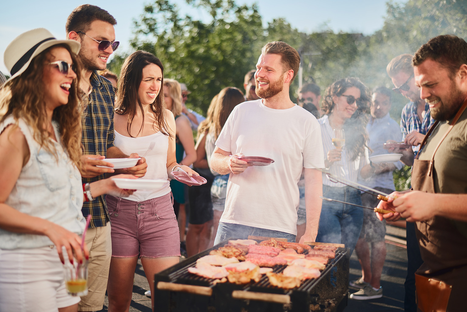 asado-tradition-living-in-paraguay group enjoying traditional asado barbecue living in Paraguay social culture
