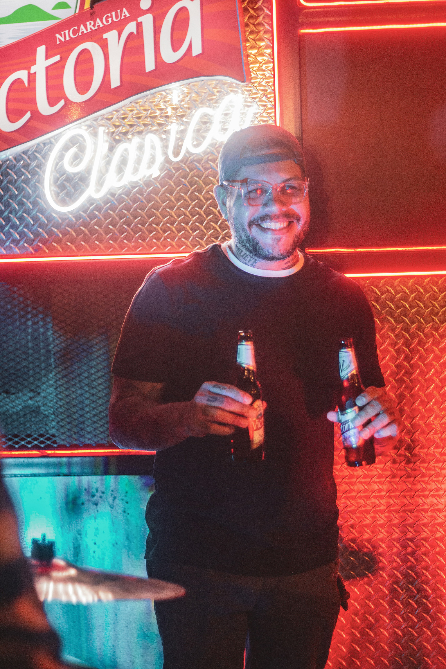 nicaragua-nightlife-guy-beer-club Enjoying nightlife in Nicaragua — many expats appreciate the social scene in places like San Juan del Sur where they live