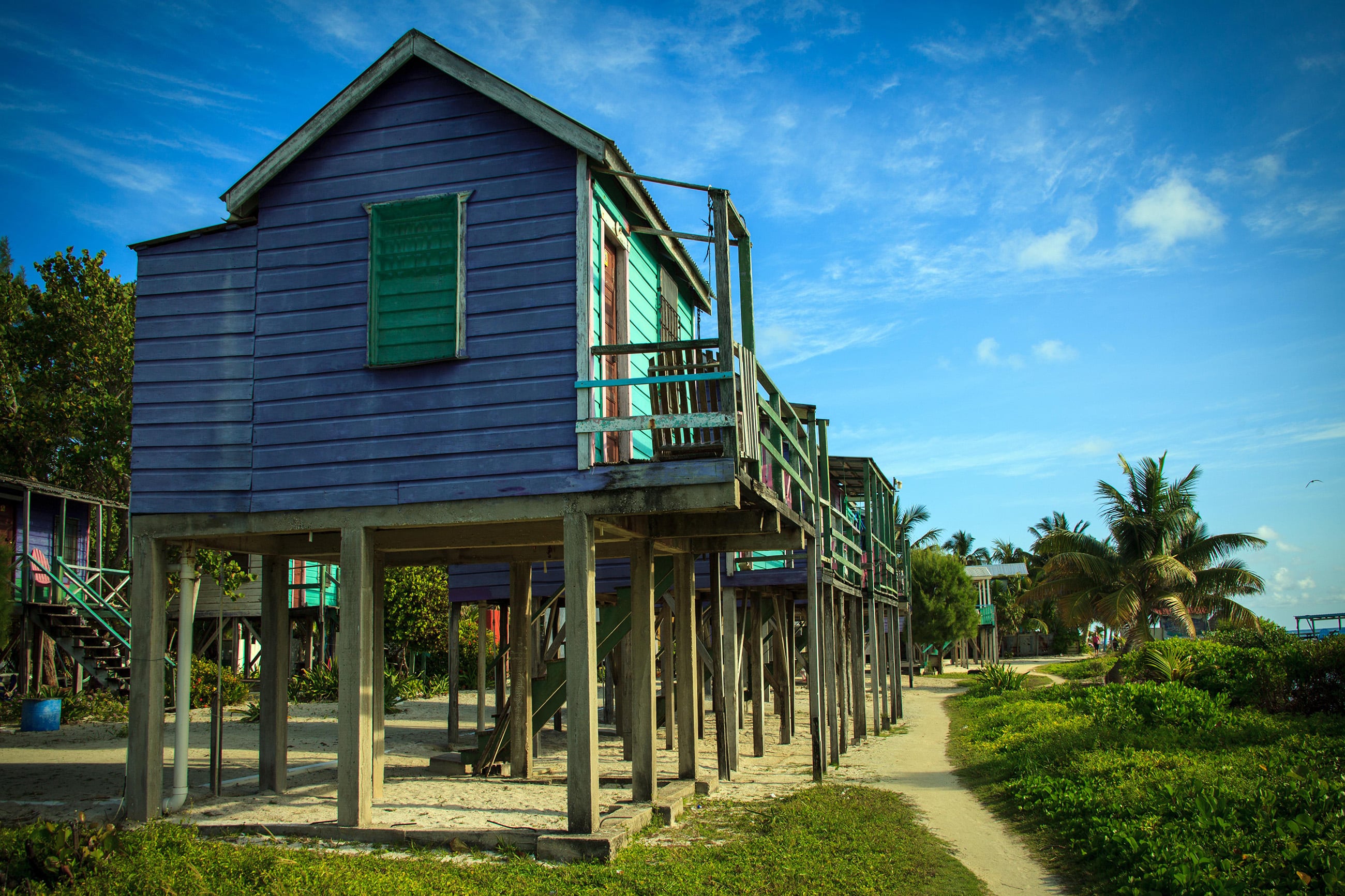 Vacation cabins on stilts by the ocean in Belize