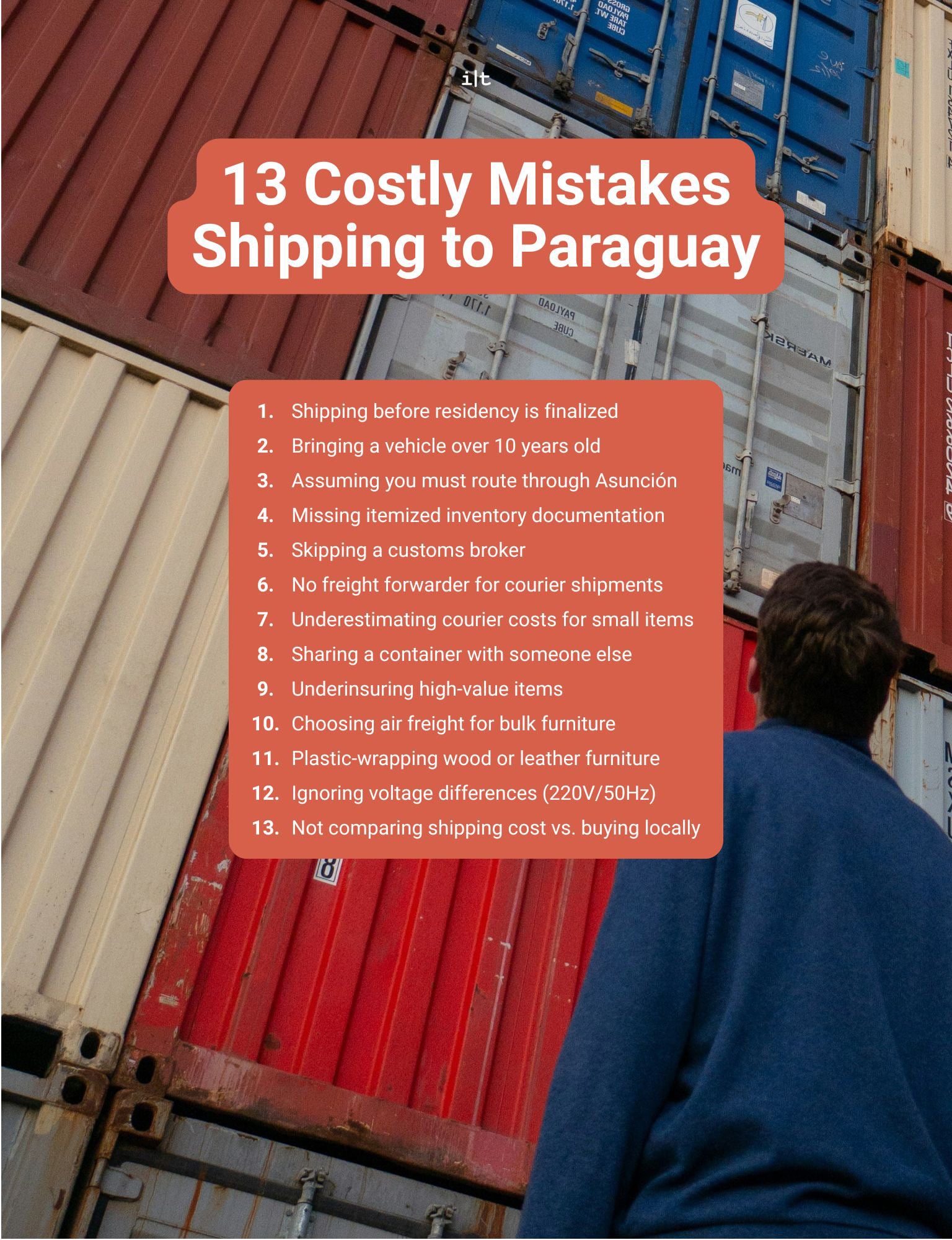 13-mistakes-shipping-to-paraguay-containers Man looking up at stacked shipping containers, representing 13 costly mistakes shipping to Paraguay