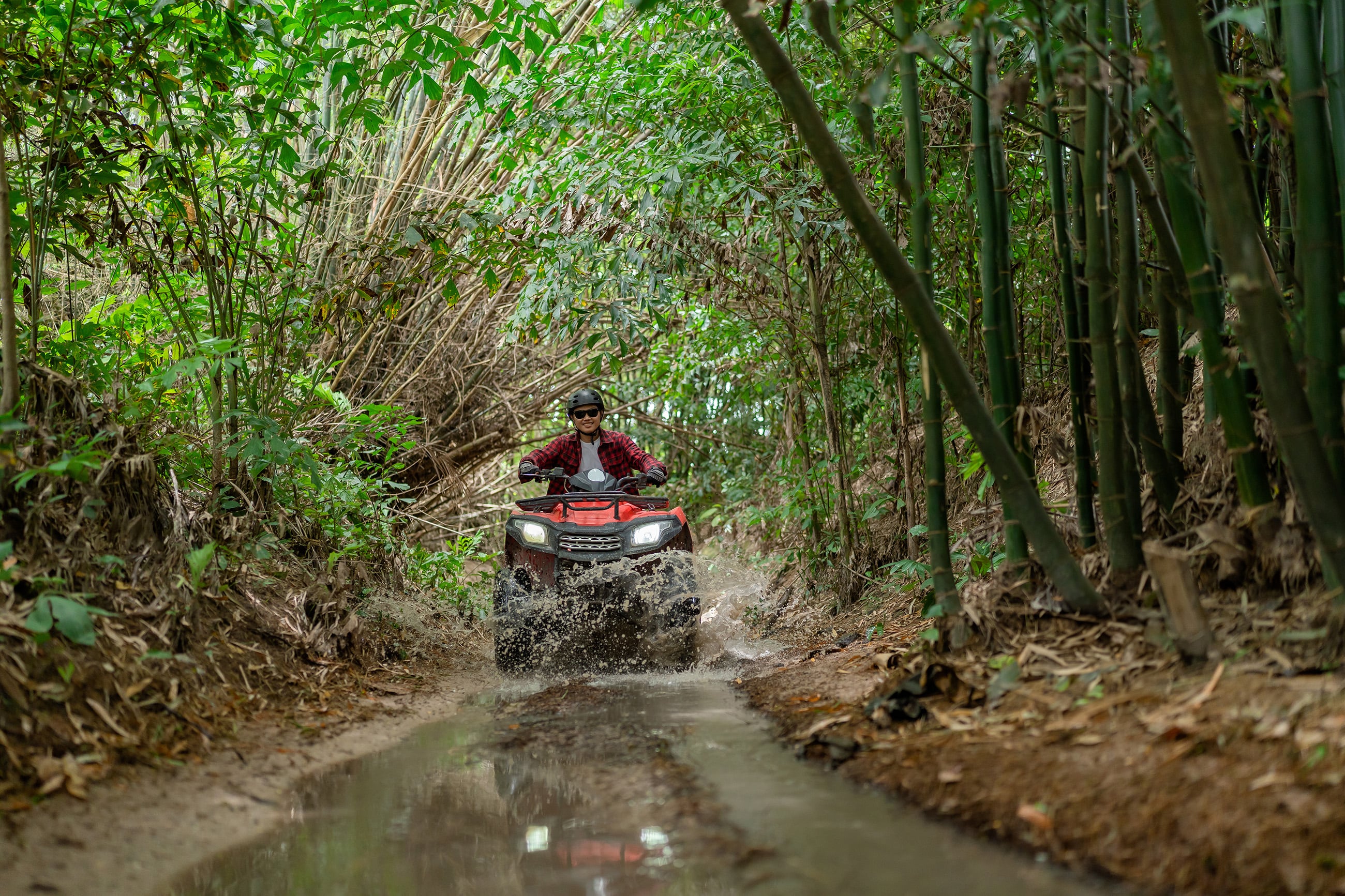belize-qrp-man-atv-jungle-adventure Man enjoying ATV adventure in the Belize jungle on the Qualified Retirement Program 2026