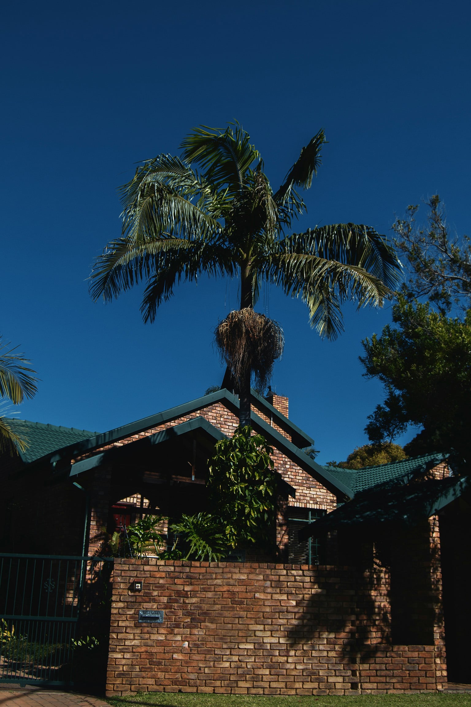 Brick-walled home in a residential neighborhood in Paraguay